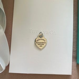 AUTH Tiffany and Co Blue Small Heart Tag